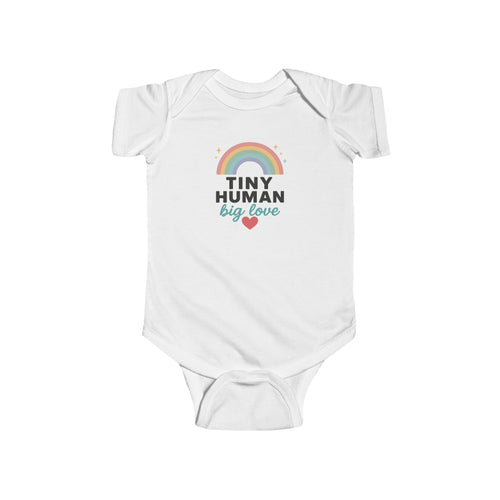 White baby onesie with rainbow and text design on a white background
